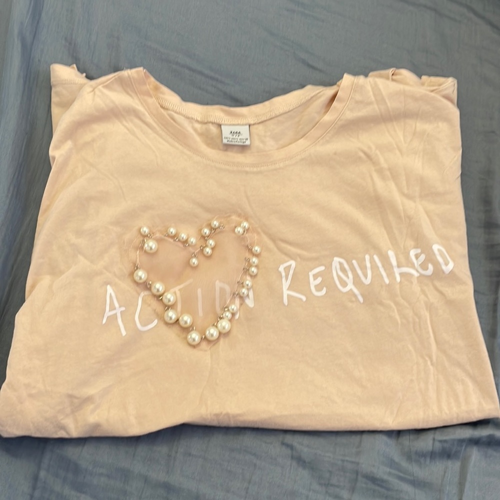 Excellent condition Zara Peach Action Required Pearl Shirt. Size L.